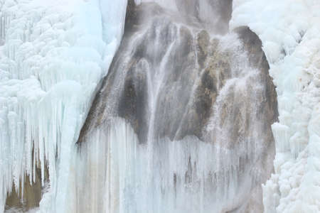 Frozen waterfalls on Plitvice lakes, National park in Croatiaの写真素材