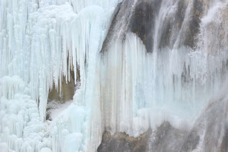 Frozen waterfalls on Plitvice lakes, National park in Croatiaの写真素材