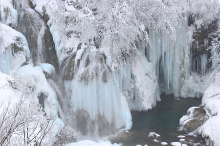 Frozen waterfalls on Plitvice lakes, National park in Croatiaの写真素材