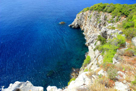 Beautiful landscape with rocky cliffs and blue sea near Dubrovnik, Croatiaの写真素材