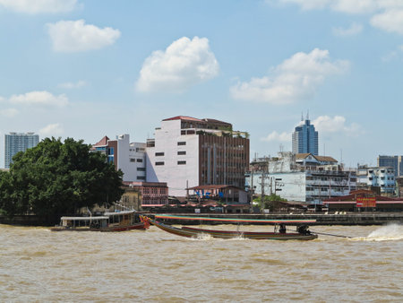 BANGKOK, THAILAND - OCTOBER 2, 2016: Long tail boat serving for tourist to travel around the Chao Phraya river in Bangkok, Thailand.のeditorial素材