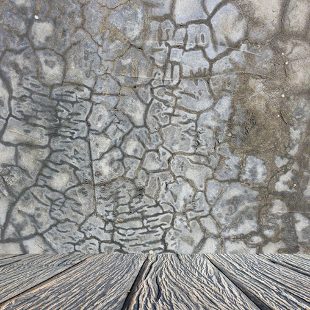 Empty interior for design, Crack concrete wall and wooden floor. Empty room. Space for text and picture. Design ideas and style.の写真素材