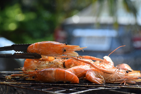 Fresh shrimp grilled on the flaming grill. seafoodの写真素材