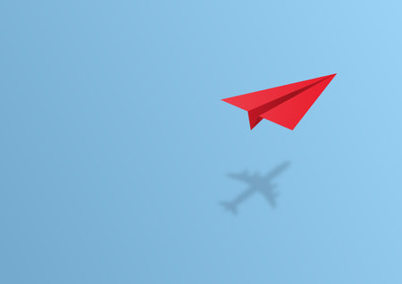 paper plane shadow is an airplane on blue background travel, business idea, leadership,...