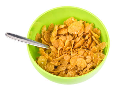 Cereals in green bowl on white background