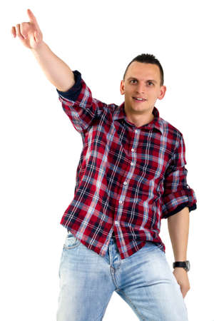 Young man pointing isolated on whiteの写真素材