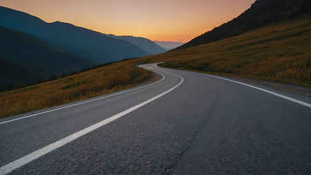 Asphalt road in the mountains at sunset. Landscape with asphalt roadの素材