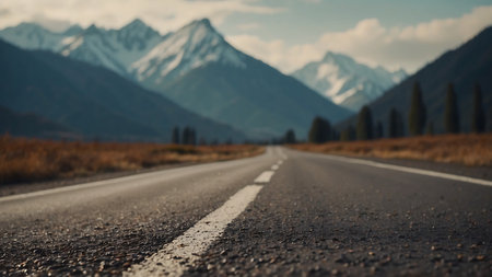 Asphalt road in New Zealand alps and mountains in the backgroundの素材