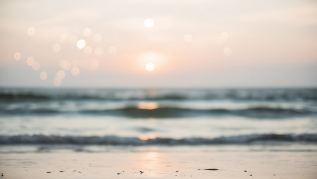 Blur image of sunset on the beach with bokeh background.の素材