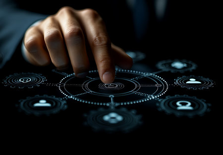 Close up of businessman hand touching icon of media screen on dark backgroundの素材