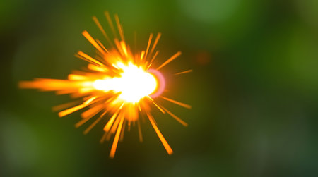 abstract bokeh background from firecracker on green backgroundの素材