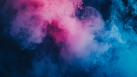 Abstract smoke moves in a blue and pink on a black isolated backgroundの素材