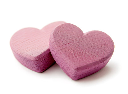 Two wooden hearts isolated on white background. Valentine's day concept.の写真素材
