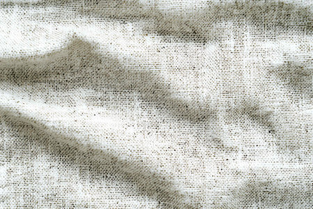 Closeup detail of white fabric texture background with grunge brush strokesの写真素材
