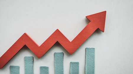 Business graph showing growth on white background, business success and growth conceptの写真素材