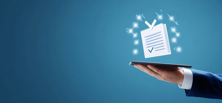 Close up of businessman hand holding tablet pc with document and check markの写真素材