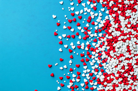 Red and white hearts on blue background. Valentines day background.の写真素材
