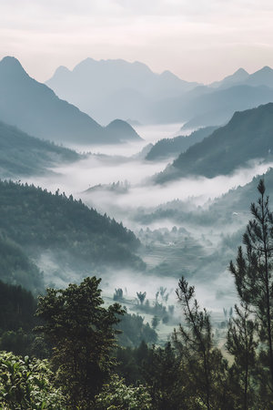 Mountain landscape with fog in the morning.の写真素材
