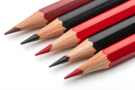 red and black pencils isolated on a white background. studio.の写真素材