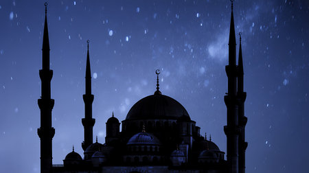 Silhouette of mosque in the night sky with falling snow.の写真素材