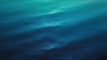 Underwater background of blue ocean surface with ripples and waves.の写真素材