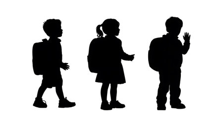 Silhouette of a little boy and girl with backpack on white backgroundの写真素材