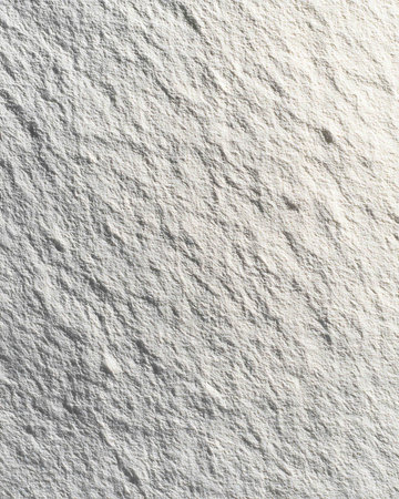 White stone texture background. Close up of white stone surface with natural pattern.の写真素材