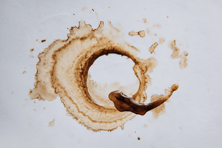 Coffee stain isolated on white background. Top view. Flat lay.の写真素材