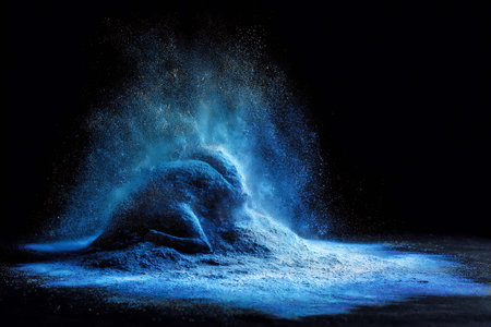 abstract blue powder explosion on black background,abstract blue powder explosion on black backgroundの写真素材