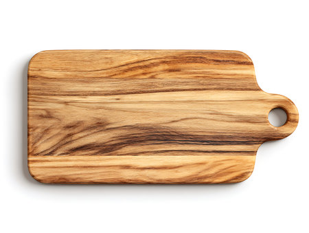 Wooden cutting board isolated on white background with clipping path. Top view.の写真素材