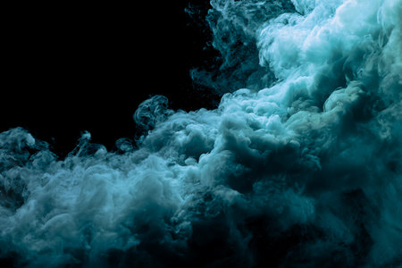 Abstract blue cloud of smoke on a black background. Design element.の写真素材