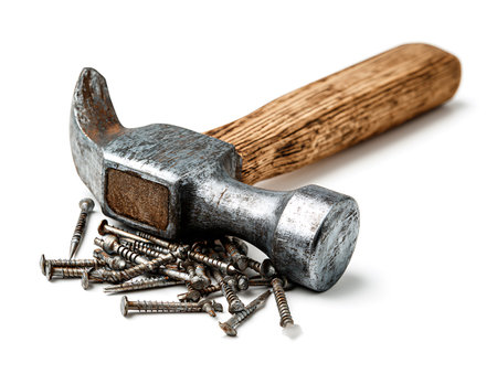 Hammer and nails isolated on white background. Clipping path included.の写真素材