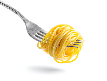Spaghetti on a fork isolated on white background, clipping path includedの写真素材