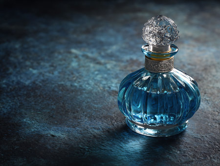 Vintage bottle of perfume on grunge background with copyspaceの写真素材
