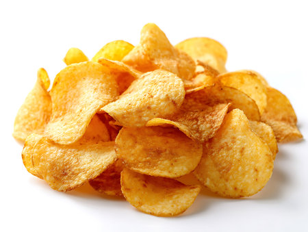 Potato chips isolated on white background. Close-up, selective focus.の写真素材