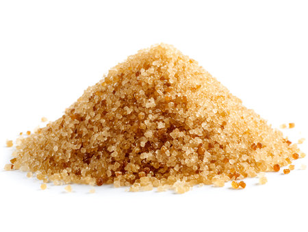 Brown sugar pile isolated on white background close up. Healthy food.の写真素材