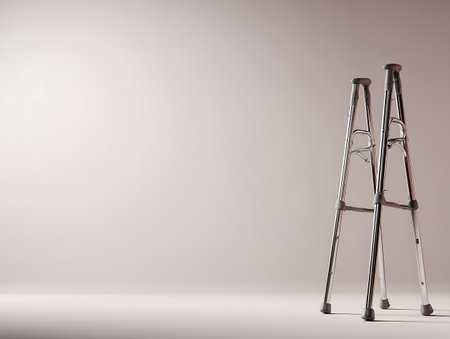 3d rendering of a metal tripod on a gray background with copy spaceの写真素材
