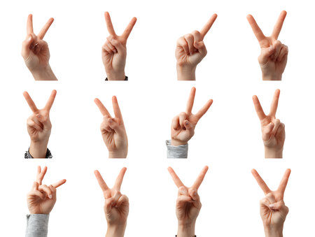 Set of female hands showing victory sign on white background, closeupの写真素材