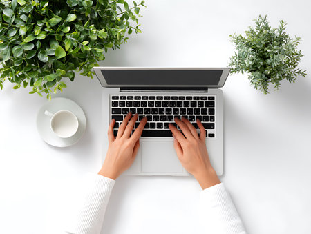 Woman working with laptop at table, top view. Work from home conceptの写真素材