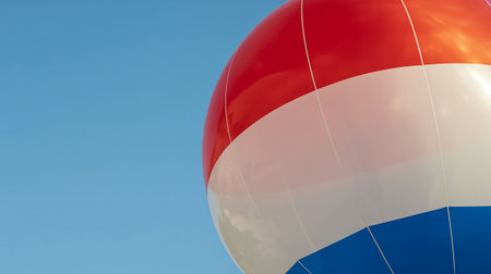 Hot air balloon against blue sky, closeup of a ballonの写真素材