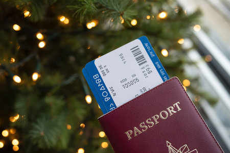 passport and boarding pass on the background of the Christmas tree.の写真素材