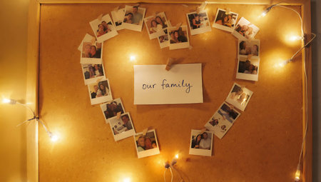 Wedding photo album in the shape of a heart with lightsの写真素材