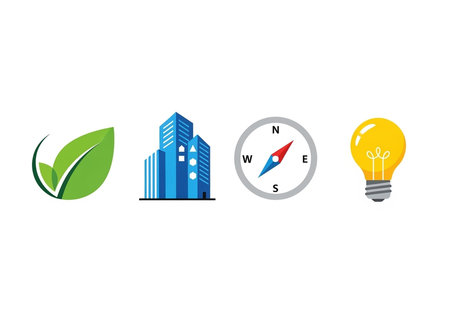 Four colorful icons: green leaf, blue city skyline, compass, and yellow lightbulb on white background.の写真素材
