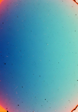 A vibrant and colorful abstract background with a gradient of blue and pink huesの写真素材