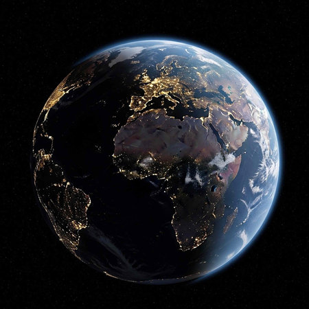 A stunning view of the Earth from space with city lights shining brightly at nightの写真素材