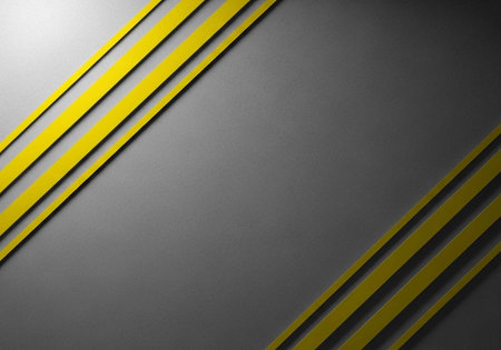 A modern abstract design featuring yellow stripes on a gray background with a metallic sheen and diagonal linesの写真素材