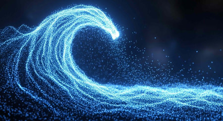 A glowing blue wave of light particles crests in a dark background, showcasing a sparkling digital ocean wave with gradient effect.の写真素材