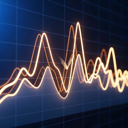 A glowing orange line graph on a dark blue background with a grid patternの写真素材