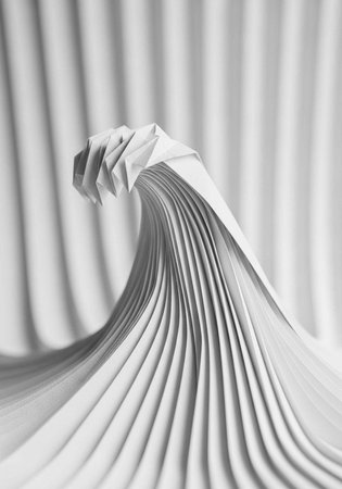 White fabric with wavy pleats and smooth folds against a blurred backgroundの写真素材