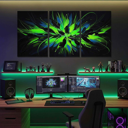 A well-lit home office with a triple monitor setup, green ambient lighting, and a large abstract art piece above the deskの写真素材
